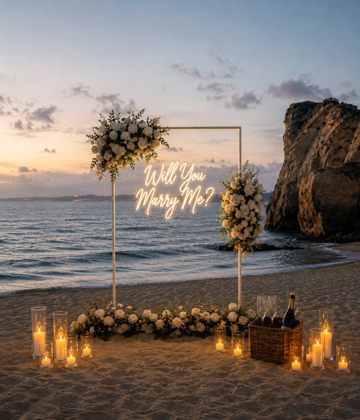 hite proposal arch, beach marriage proposal, luxury engagement setup, romantic proposal décor, sunset proposal inspiration, elegant wedding proposal arch, candles and flowers proposal, private beach engagement.